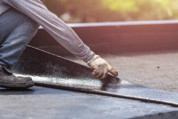 Professional Waterproofing technician working in Lake Zurich, IL